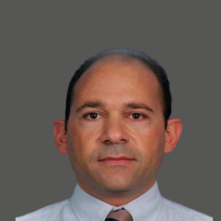 Man's headshot in a white shirt