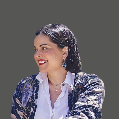 Smiling woman in jacket.